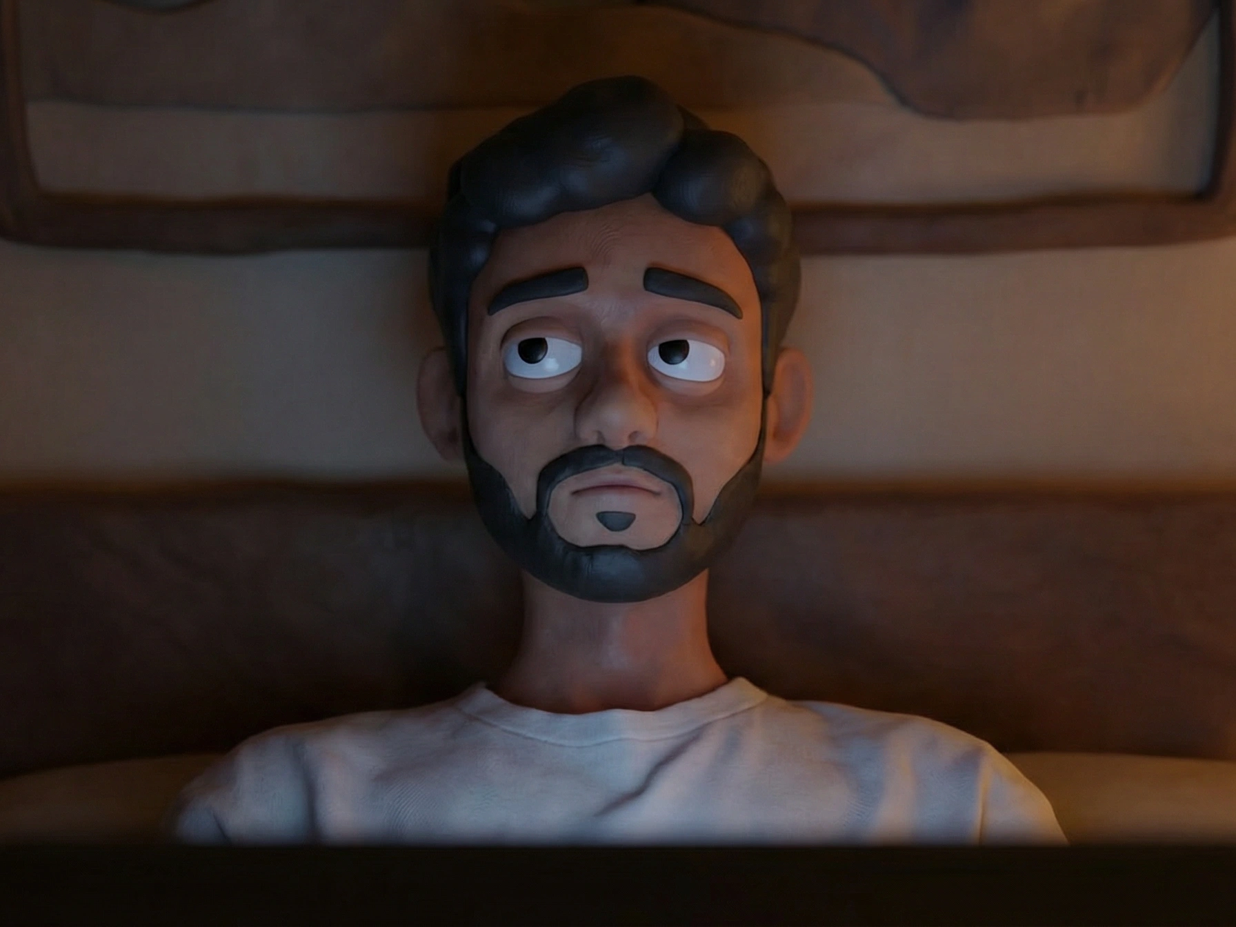 ENDL animated character, worried at laptop in bed