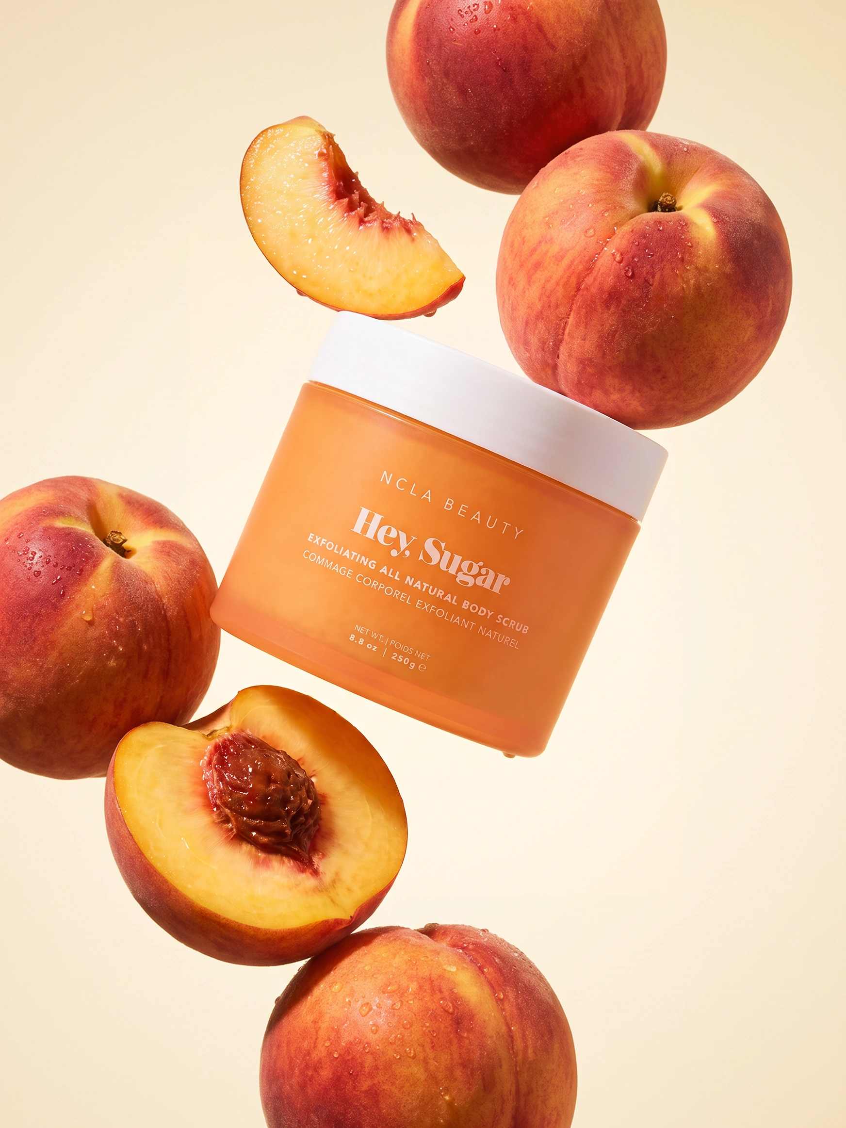 NCLA Beauty Hey Sugar scrub, floating peaches