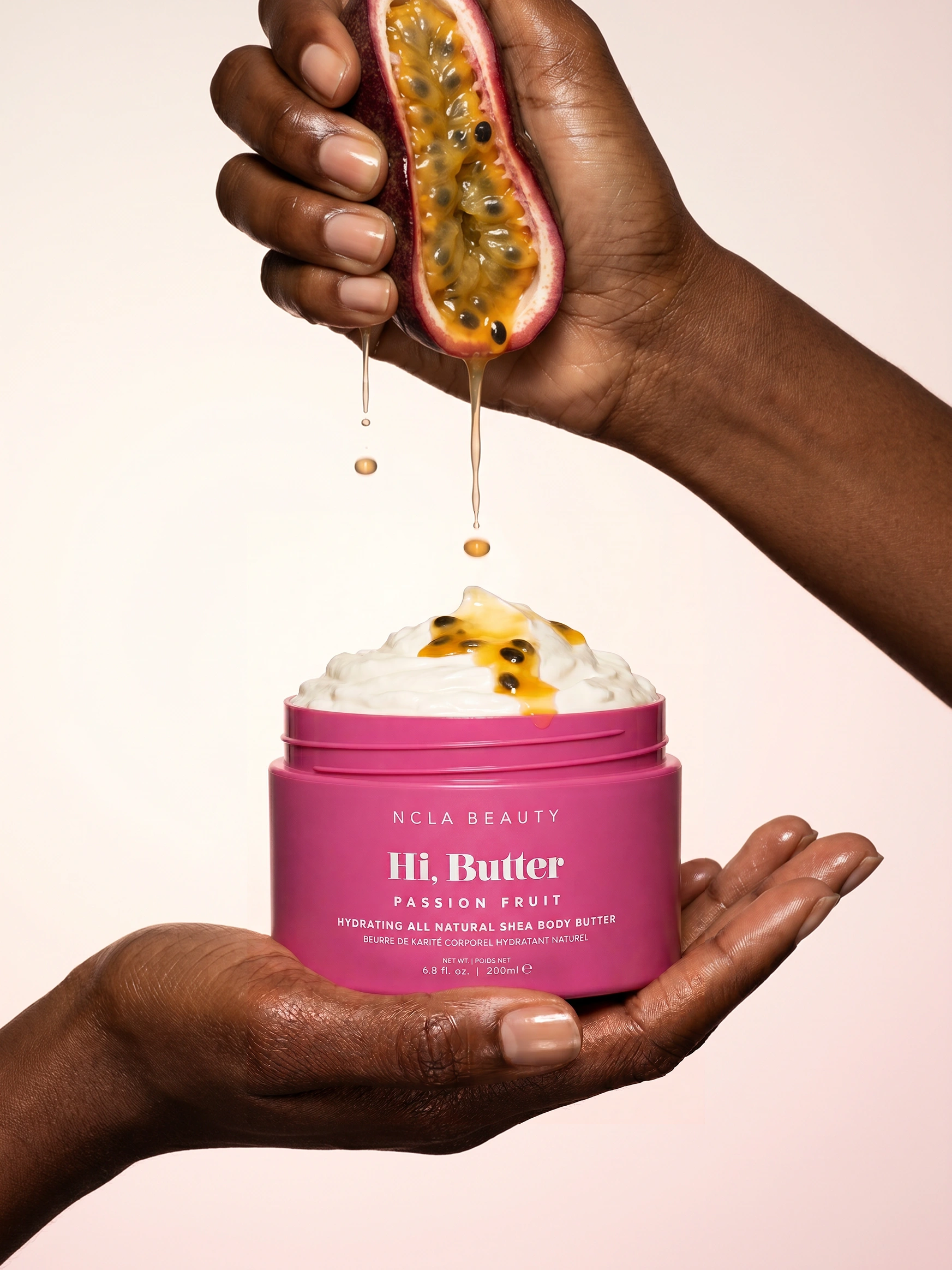 NCLA Beauty Hi Butter, passion fruit in hand